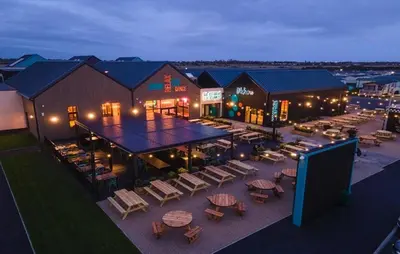 an aerial view of a resort with tables and chairs at 8 berth caravan Martello Beach Clacton in Jaywick Sands