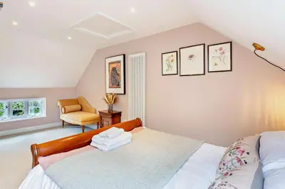 a bedroom with a bed and a chair at 2 Bed in Rede oc-t29450 in Rede