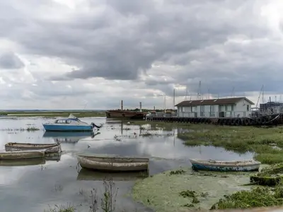 a group of boats sitting in the water at The Pontoon - Pass the Keys in Southend-on-Sea