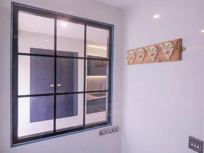 a window in a white wall with black trim at Number 1 in Sudbury