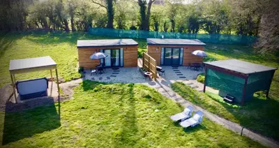 an aerial view of a cabin in a field at Rocklands Retreat in Rockland Saint Peter