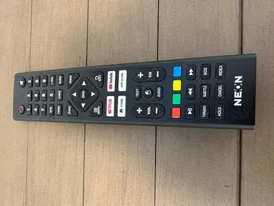 a remote control sitting on top of a wall at The Cosy Place near centre in Ipswich