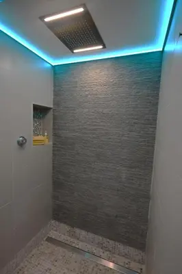 a bathroom with a shower with a blue ceiling at Luxury Non Smoking 2 bedroom retreat in Norfolk in Attleborough