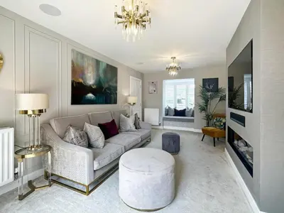 a living room with a couch and a table at Colchester Spacious Double Rooms in CO4 in Mile End