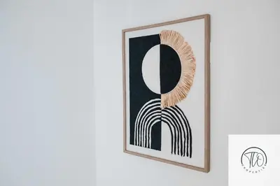 a picture of a black and white painting on a wall at Jardine House in Colchester