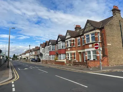 a row of houses on the side of a street at Stylish and artistic flat in Southend on Sea - 2 Double Bedrooms, Free on-street parking in Southend-on-Sea