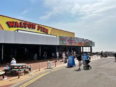 a building with a walnut pub on the beach at Cottage in Walton on the Naze in Walton-on-the-Naze