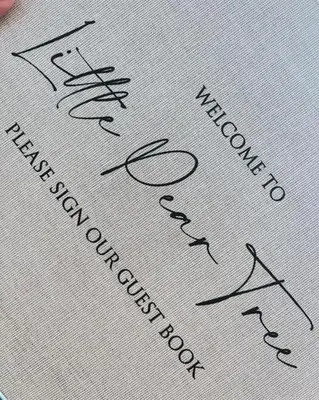 a piece of paper with handwriting on it at Little Pear Tree in Stock