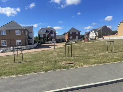 an empty playground in a residential neighborhood with houses at Modern-luxury 1bedroom-EnsuiteBathroom-Garden-Wifi in Basildon