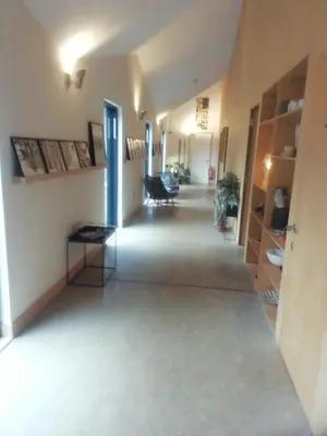 an empty hallway of a house with a room with a hallway at Five Acre Barn in Leiston