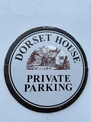 a sign that reads forest house private parking at The Snug - Town Centre Apartment in Bishops Stortford