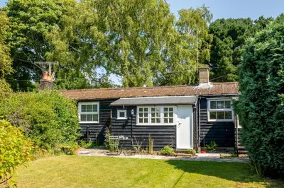 a small house with a garden in front of it at 6 Uplands in Thorpeness