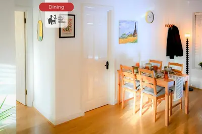 a dining room with a table and chairs at Quiet Premium Stansted Apartment in Central Location with WiFi and Desk in Stansted Mountfitchet