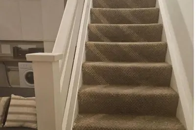a staircase in a house with a stair case at 1 Bed House Sleeps 2 -Free Parking -Tv in Romford