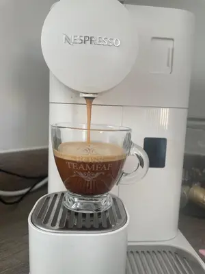 a coffee maker with a cup of coffee at Cosy room in Great Bromley