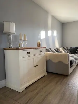 a living room with a couch and a table at Modern Luxe Maisonette Near Station With Free Parking in Billericay