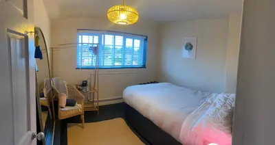 a small bedroom with a bed and a window at relaxed and peaceful #2 in St Ives