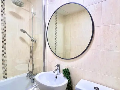 a bathroom with a sink and a mirror at Bibis Home - Hertford in Hertford