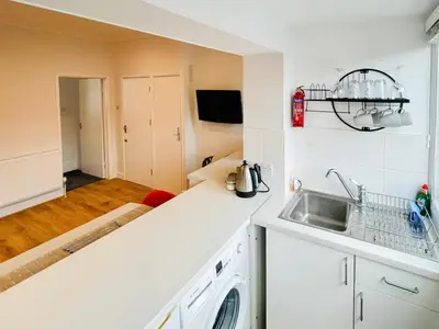 a kitchen with a sink and a counter top at Sea Leigh in Leigh-on-Sea