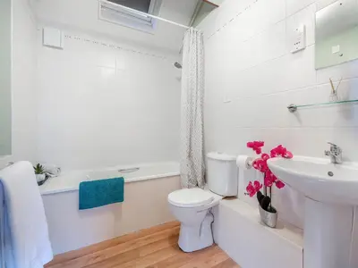 a white bathroom with a toilet and a sink at Robin - Uk48171 in Colchester