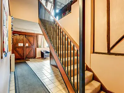 a staircase in a house with a hallway at Partridge - Uk48173 in Colchester