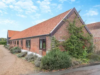 a red brick building with a red roof at Swallow - Uk48172 in Colchester