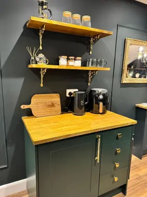 a kitchen with a counter with a coffee maker on it at The Green Scholar's Nook in Cambridge