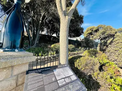 a statue of a vase next to a fence at Stunning 2 bedroom flat for 5 people overlooking the sea 2A in Felixstowe