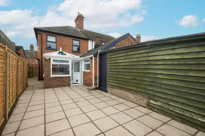 an empty driveway in front of a house at 10 Jubilee Cottage in Leiston