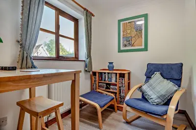 a room with a desk and a chair and a window at 4 Bed in Woodbridge oc-s27356 in Martlesham