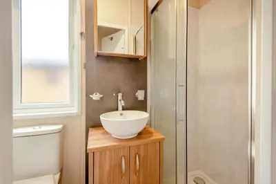 a bathroom with a sink and a shower at 2 Bed in Welney oc-c30124 in Welney