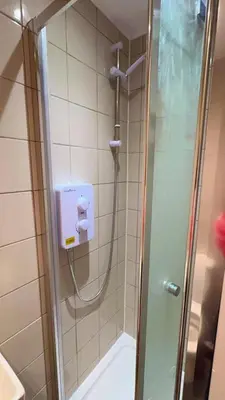 a shower in a bathroom with a glass shower backdoor at M18 Escape in Havering atte Bower