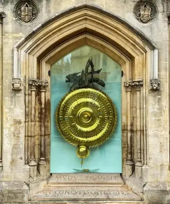 a large gold object in a glass window on a building at Modern 1Bed Apartment supercentral in Cambridge