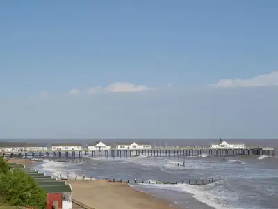 a view of a beach with a pier at The Stables - E3491 in Saxtead