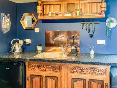 a kitchen with a sink and a counter top at The Fox - Uk48554 in Colchester