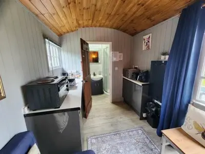 a room with a kitchen with a counter top at M Lodge in Colchester