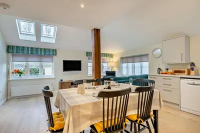 a kitchen and dining room with a table and chairs at 2 Bed in Wickhambrook oc-b30507 in Wickhambrook