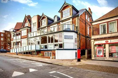 a large building on the corner of a street at Modern 2 Bedroom Apartment with Sea view in Felixstowe