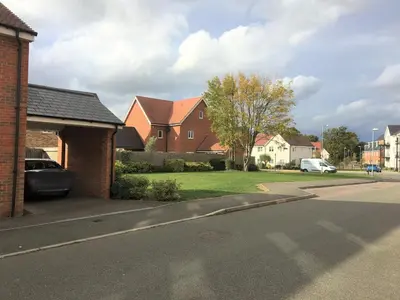 a street in a residential neighborhood with houses at Detached Place to stay in Essex in Witham