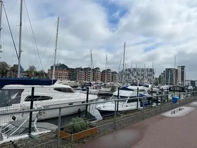 a group of boats docked in a marina at Delightful-Ipswich Suffolk-4 Bed-SelfCatering-Contractor-Parking-Wifi in Copdock