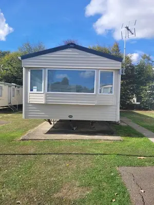 a tiny house is parked in a yard at Highfield Grange Holiday Park in Clacton-on-Sea