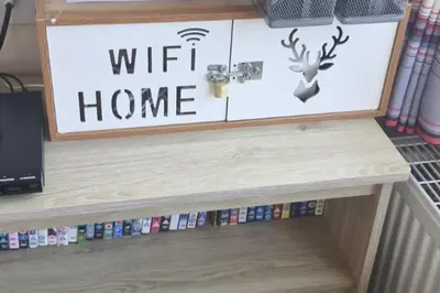 a wifi home sign in a wooden box on a shelf at Highfield Grange Holiday Park in Clacton-on-Sea