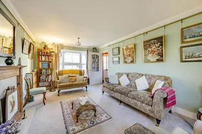 a living room with a couch and a chair at 3 Bed in Hingham oc-m29945 in Hingham