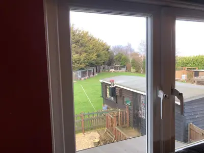 an open window with a view of a yard at Country View place in Weeley