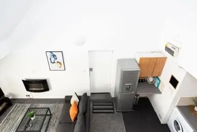 a view of a living room with a couch at 1 Bed Split Level Apartment- Leigh-on-Sea in Southend-on-Sea