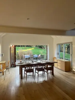 a large dining room with a table and chairs at Charming Cottage nestled in the heart of a picturesque village in Westleton
