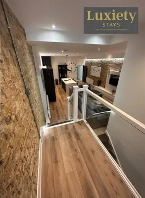 a stairway in a building with a room at Sleek & Stunning 2BR APT By Luxiety Stays Short Lets & Serviced Accommodation Southend on sea With Free WiFi, Smart TV, Netflix in Southend-on-Sea