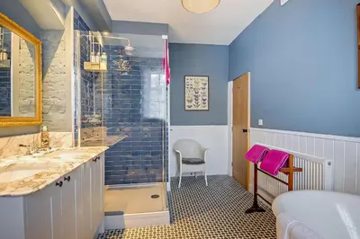 a bathroom with a shower and a sink at 3 Bed in Wymondham oc-t30596 in Wymondham