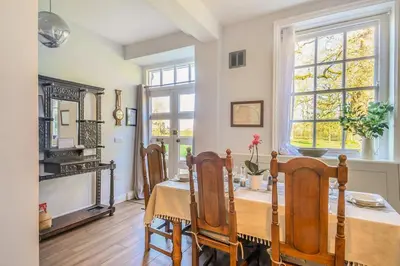 a dining room with a table and chairs at 3 Bed in Wymondham oc-t30596 in Wymondham