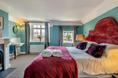 a bedroom with a bed with two towels on it at 6 Bed in Wymondham oc-t30598 in Wymondham